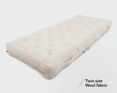 natural wool todler mattress (ikea sniglar) with handles