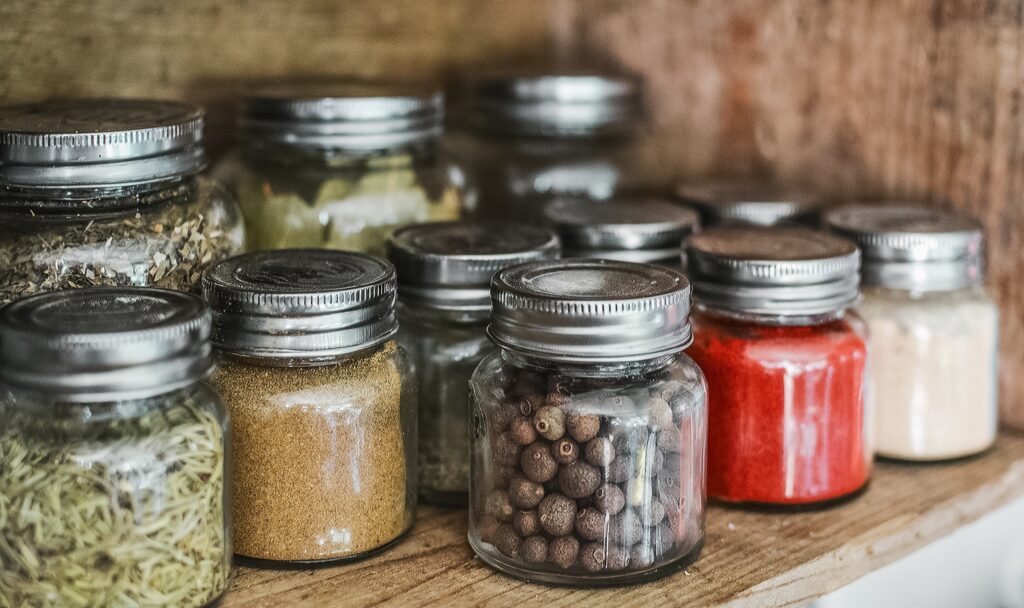 various glass jars of herbs