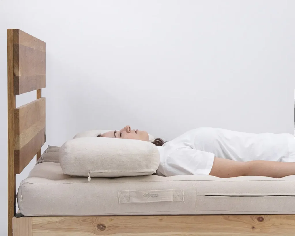 girl sleeping on back and side wool pillow