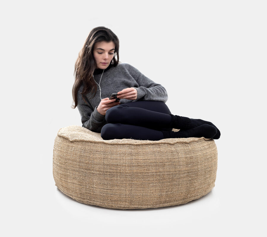 Wool Round Ottoman with Flat Sides with hemp cover with model