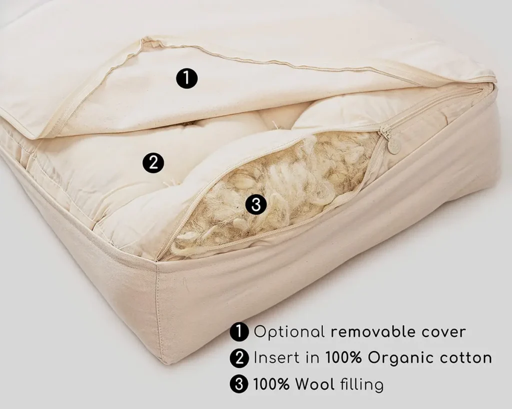 anti-reflux home of wool baby pillow unzipped revealing filling inside