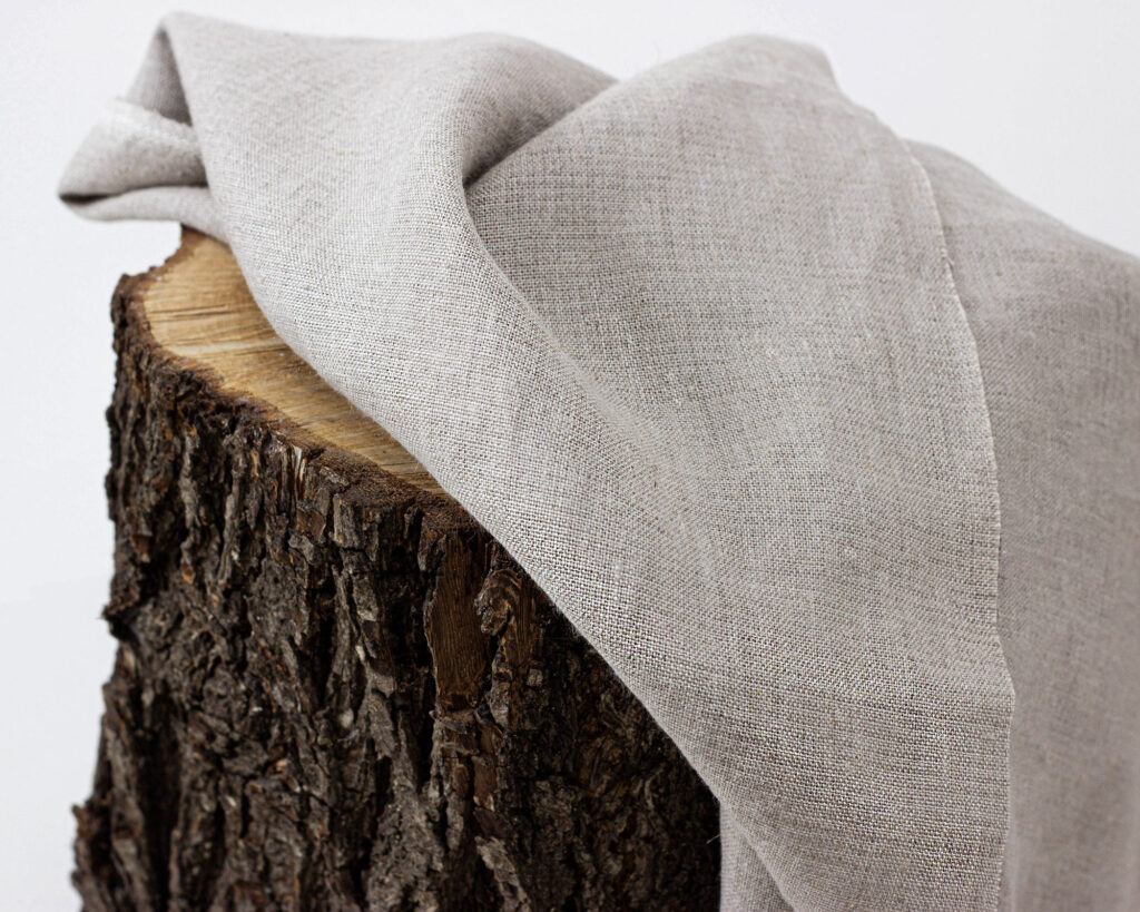 100% linen fabric midweight on a piece of wood