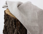 100% linen fabric midweight on a piece of wood