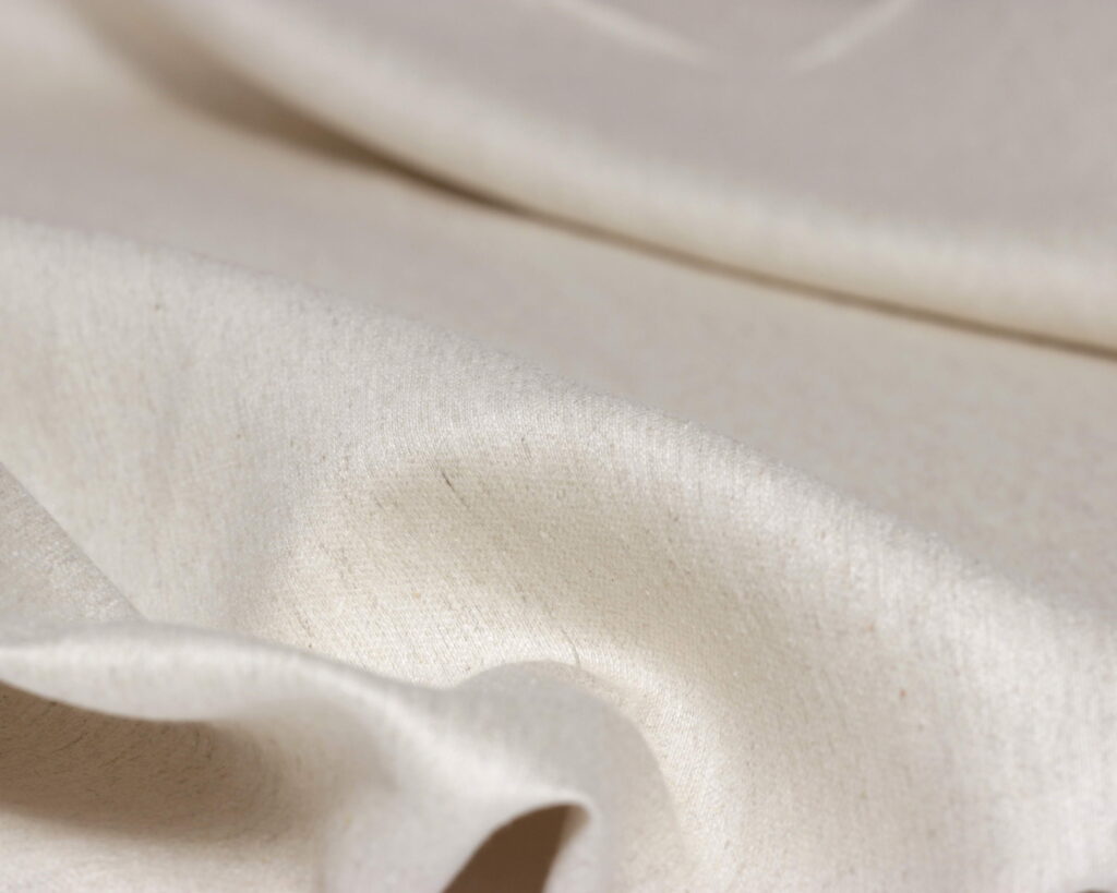 100% mulberry silk fabric close up showing folds
