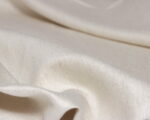 100% mulberry silk fabric close up showing folds