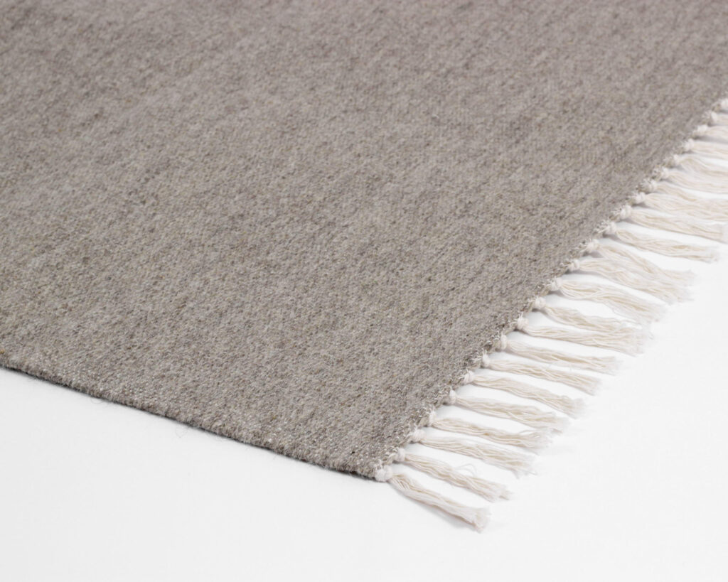 flat woven wool rug close up
