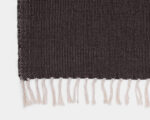 dark brown flat woven wool rug