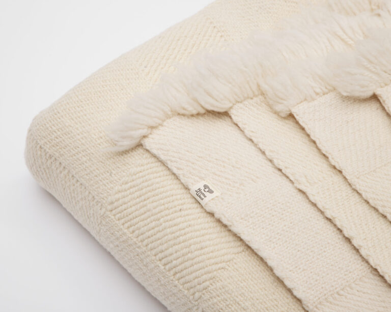 heavy merino wool blanket corner showing finges