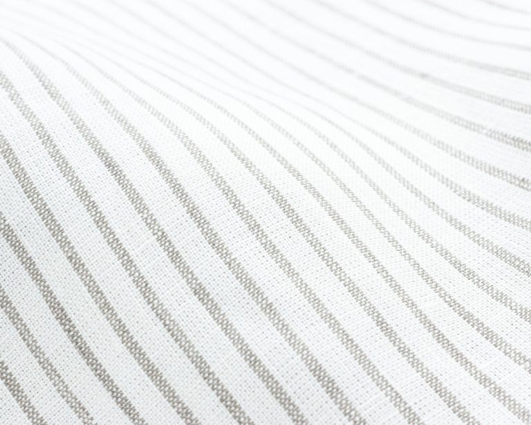 linen fabric with thin grey stripes close up