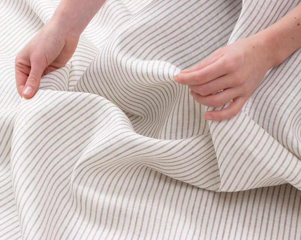 linen fabric with thin grey stripes