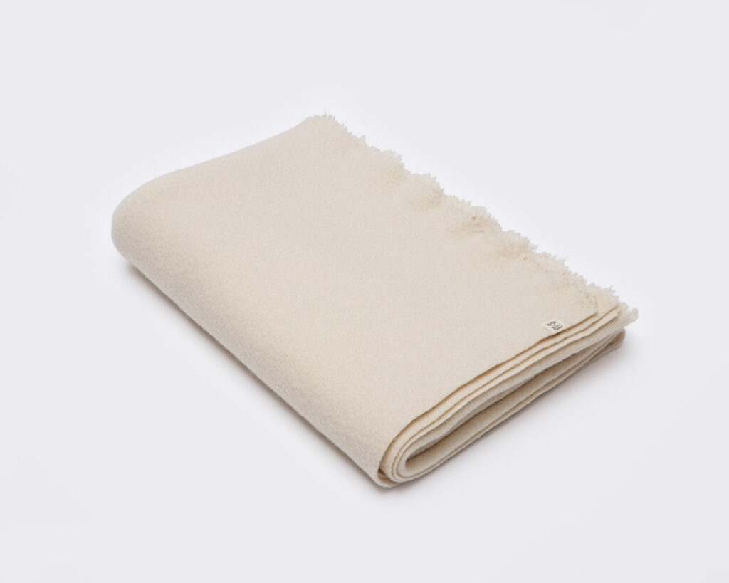 pure virgin wool blanket folded over