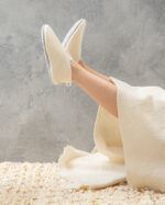 merinoulløfler på fødderne