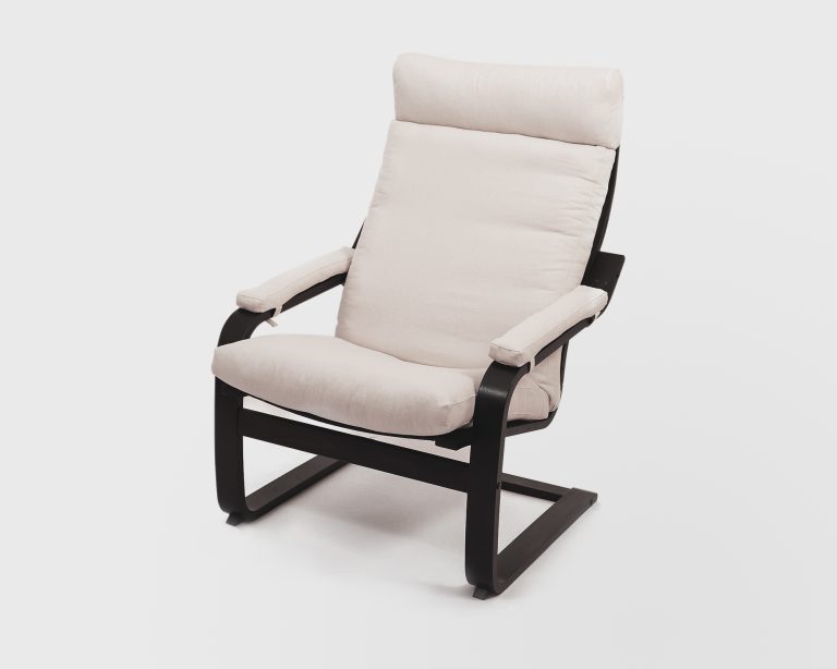 Wool cushion for poang chair with removable cover on a chair