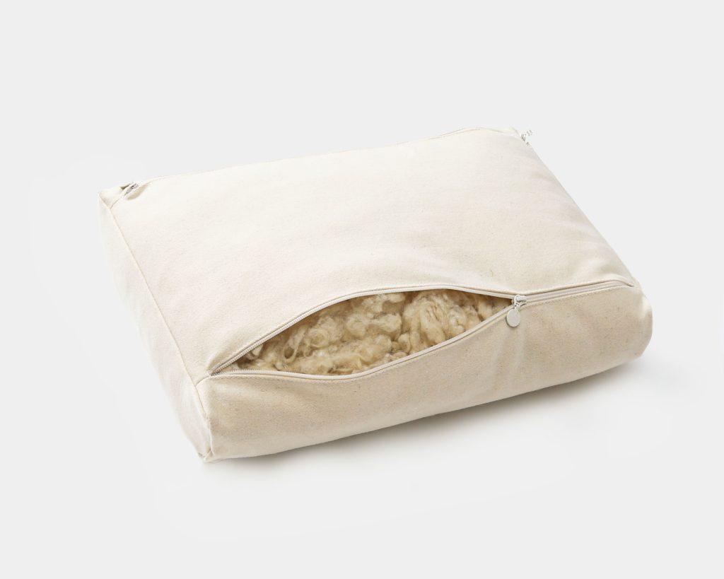 oreiller en laine à côtés plats