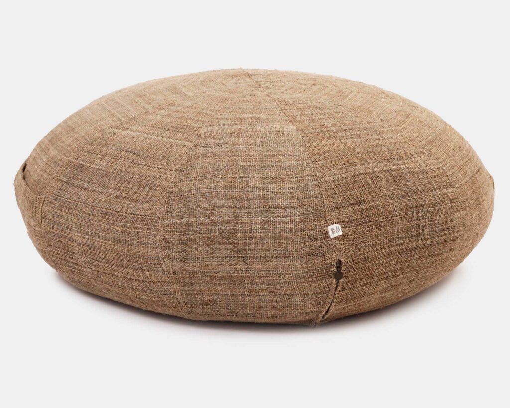 wool ottoman cushion on a white background