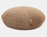 wool ottoman cushion on a white background