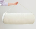 wool yoga bolster in a bag