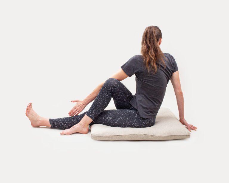 wool zabuton with a person doing yoga