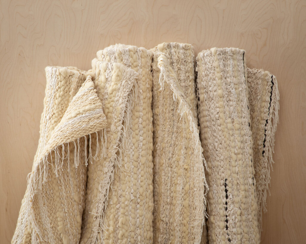 home of wool handwoven rug with wool and cotton fabrics scraps